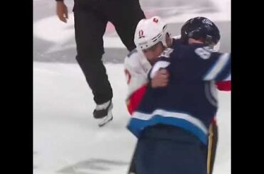 Milan Lucic drops the gloves with Nathan Beaulieu