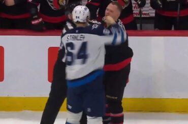 Brady Tkachuk knocked down after wild Logan Stanley sucker punch