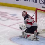 Matty Beniers scores a goal against the New Jersey Devils