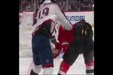 Siegenthaler just got ejected for not having his jersey strap on during his fight with Fantilli