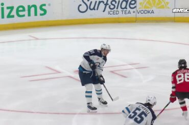 Mark Scheifele scores a goal against the New Jersey Devils
