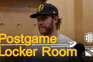 Morgan Geekie, Elias Lindholm, and David Pastrnak speak with media after overtime loss in New York