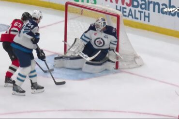 Jesper Bratt scores a goal against the Winnipeg Jets
