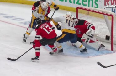 Michael McCarron scores a goal against the New Jersey Devils