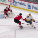 Nico Hischier scores a goal against the Nashville Predators