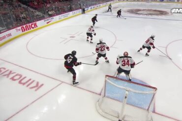 Dylan Cozens scores a powerplay goal against the New Jersey Devils
