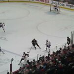 Belleville Senators' Mads Søgaard's mask falls off after a shot by Laval Rocket's Alex Belzile 1/14