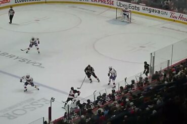 Belleville Senators' Mads Søgaard's mask falls off after a shot by Laval Rocket's Alex Belzile 1/14