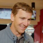Eli Manning talks New Jersey Devils while watching them play in Ottawa.
