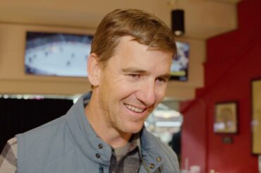 Eli Manning talks New Jersey Devils while watching them play in Ottawa.