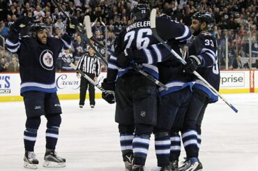 Wheeler snaps OT winner over Rinne's shoulder