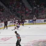 Shane Pinto scores a goal against the New Jersey Devils