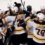 Bruins win 4th in a row on Krug OT slap shot