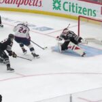 Mathieu Olivier scores a goal against the New Jersey Devils