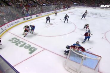 Dawson Mercer scores a goal against the Colorado Avalanche