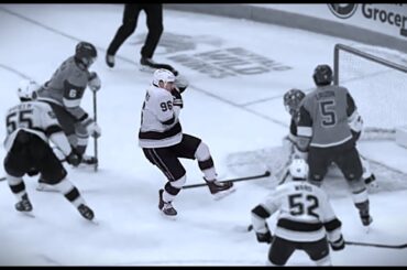 Andrei Kuzmenko Leaves the Game After Taking Puck to the Face