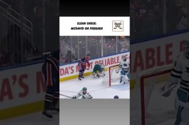 Connor McDavid throws Mario Ferraro