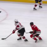 Simon Nemec scores a goal against the Chicago Blackhawks