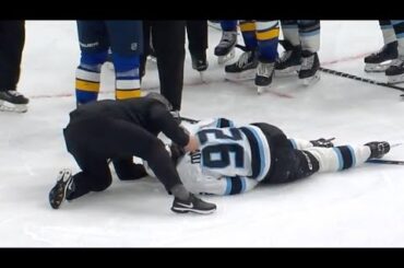 Logan Cooley injured vs St.Louis Blues after collision with Alexey Toropchenko