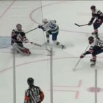 Darcy Kuemper misplays the puck and gives Elias Pettersson a free goal, a breakdown