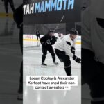 Logan Cooley & Alexander Kerfoot shed non-contact sweaters as Utah Mammoth return to practice.