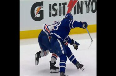 Matthew Knies sends Oiler newcomer Spencer Stastney hard into the boards 💥