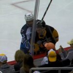 Schultz heads to dressing room after being bumped by Byfuglien