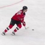 Peyton Krebs scores a goal against the New Jersey Devils