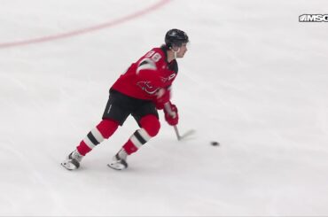 Peyton Krebs scores a goal against the New Jersey Devils