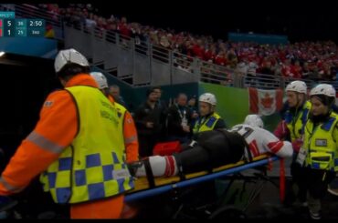 Kevin Fiala is stretchered off at the Olympics
