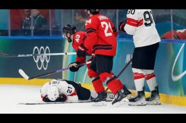 Kevin Fiala stretchered off vs Canada