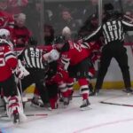 Tempers flare after Panthers' Luostarinen hits Jack Hughes at the boards