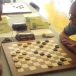 "Mastering the Corners: Georgiev's Ambitious Strategy vs. Baliakin"