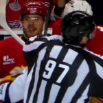 Flames' Adam Klapka takes poke at Capitals' Tom Wilson from bench, receives misconduct penalty