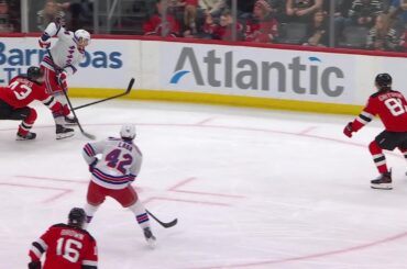 Vladislav Gavrikov scores a goal against the New Jersey Devils