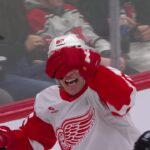 Dominik Shine scores a goal against the New Jersey Devils