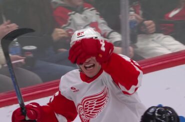 Dominik Shine scores a goal against the New Jersey Devils