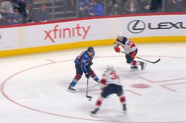 Nathan MacKinnon weaves in and out of Devils defense on Barrie's goal