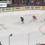 Mikael Backlund scores a goal against the New Jersey Devils