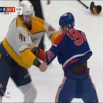 Nic Hague and Vasily Podkolzin drop the gloves 🥊