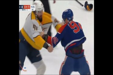 Nic Hague and Vasily Podkolzin drop the gloves 🥊