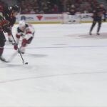 Tim Stutzle scores a goal against the New Jersey Devils