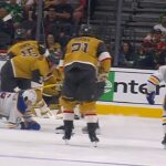 Brayden McNabb Lays a Big Hit on Zach Benson