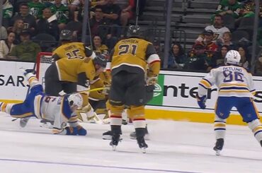 Brayden McNabb Lays a Big Hit on Zach Benson