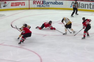 David Pastrnak scores a goal against the New Jersey Devils