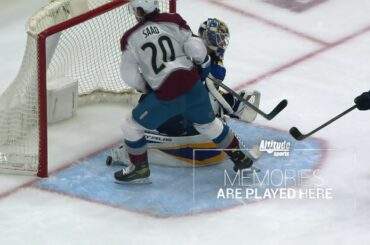Tyson Jost serves up an apple to Brandon Saad