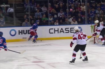 Conor Sheary scores a goal against the New Jersey Devils