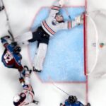 Mikko Koskinen goes into full snow angel mode for jaw-dropping save