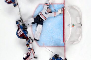 Mikko Koskinen goes into full snow angel mode for jaw-dropping save