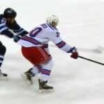 Kreider skates by Byfuglien and dekes Pavelec